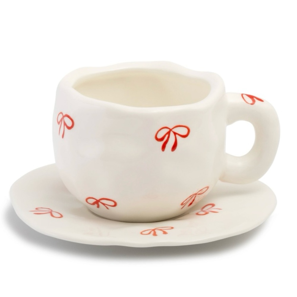 White Stoneware Mug and Saucer Set with Red Bow Motif